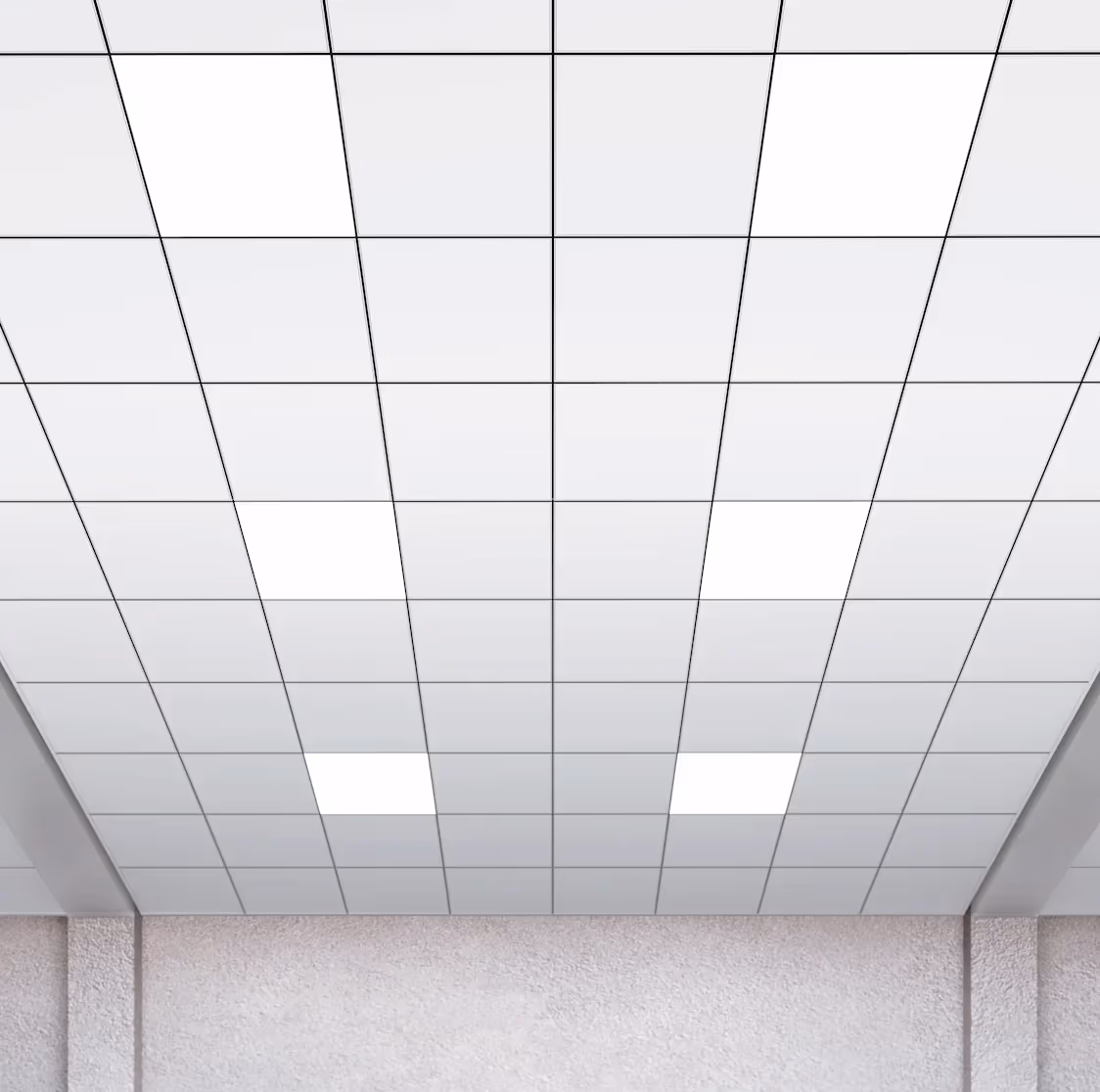 Perforated metal ceiling across a quiet open-plan office