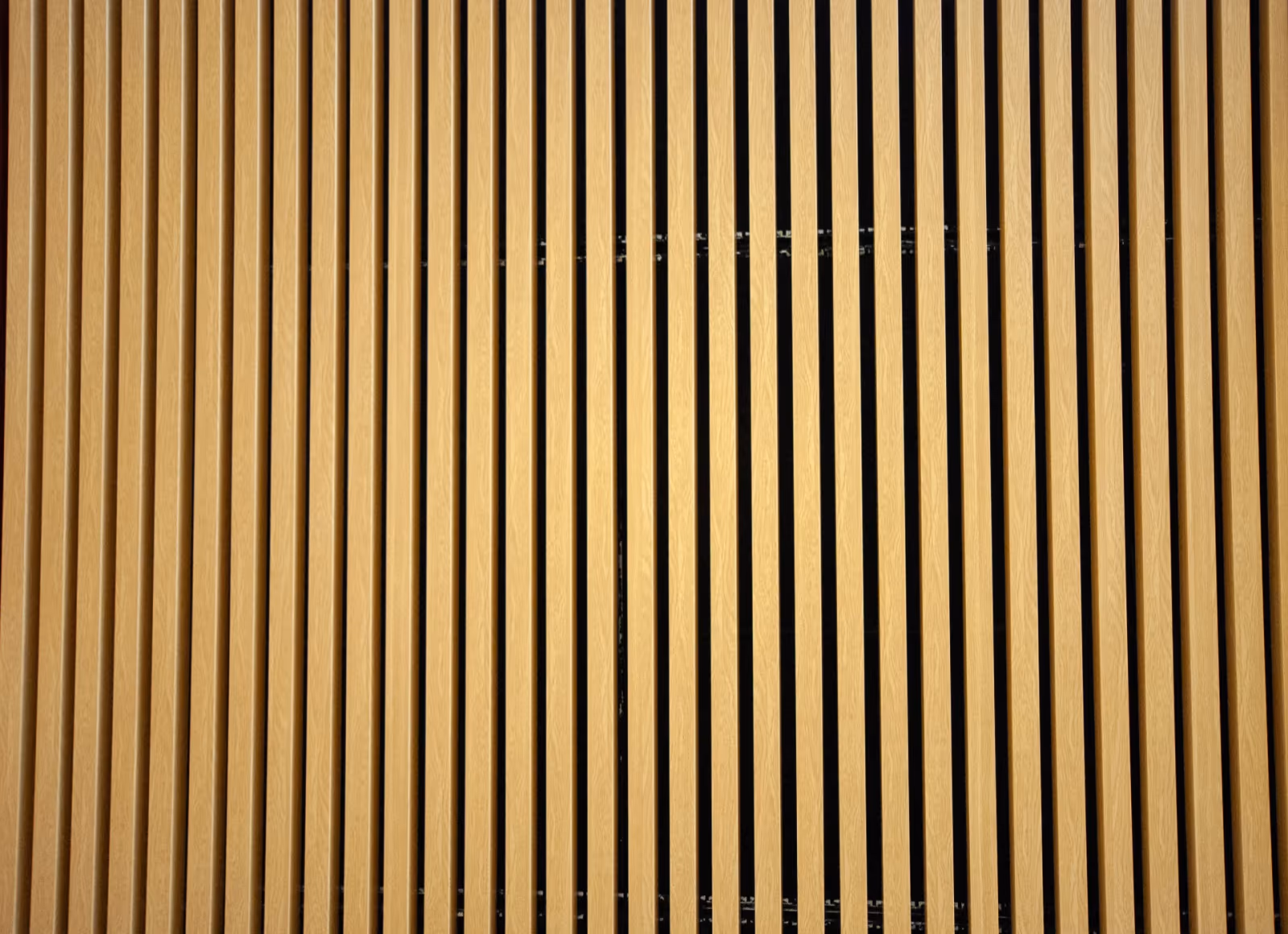 Wood grain baffle ceiling in a busy public circulation space