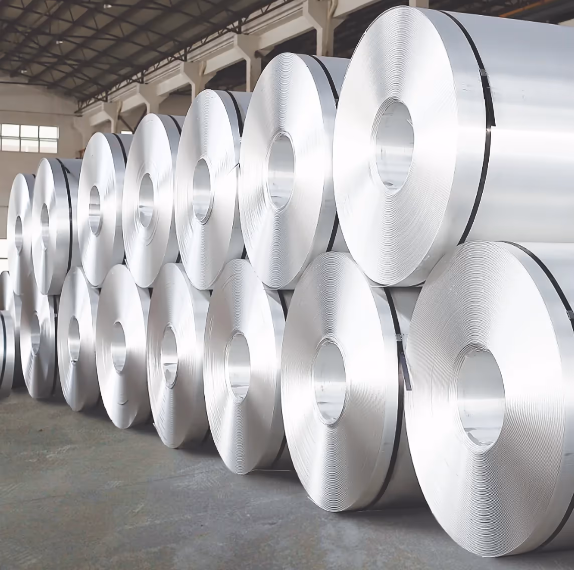 Cold-rolled aluminum coils stacked in the mill store