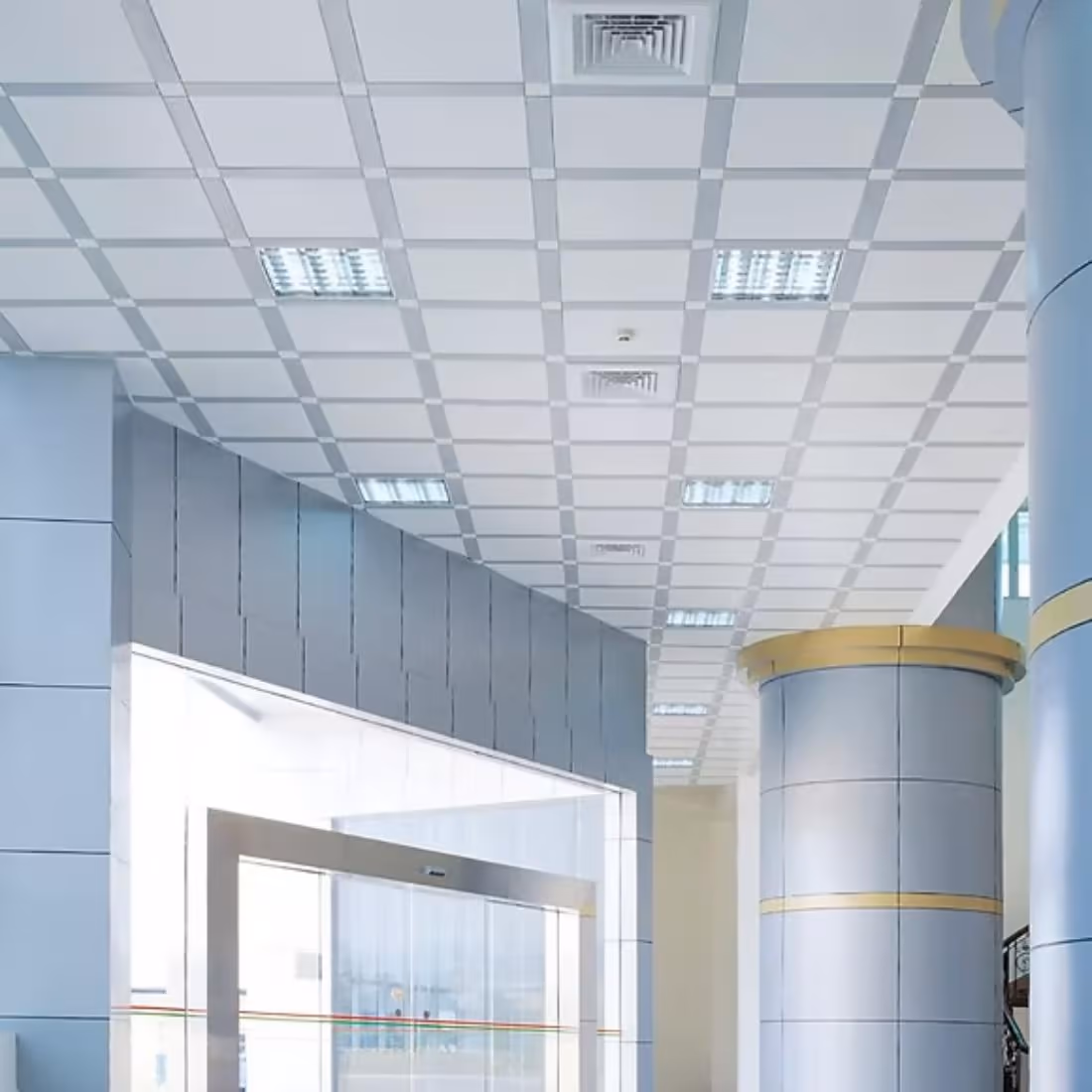 Combination ceiling over a glazed showroom frontage