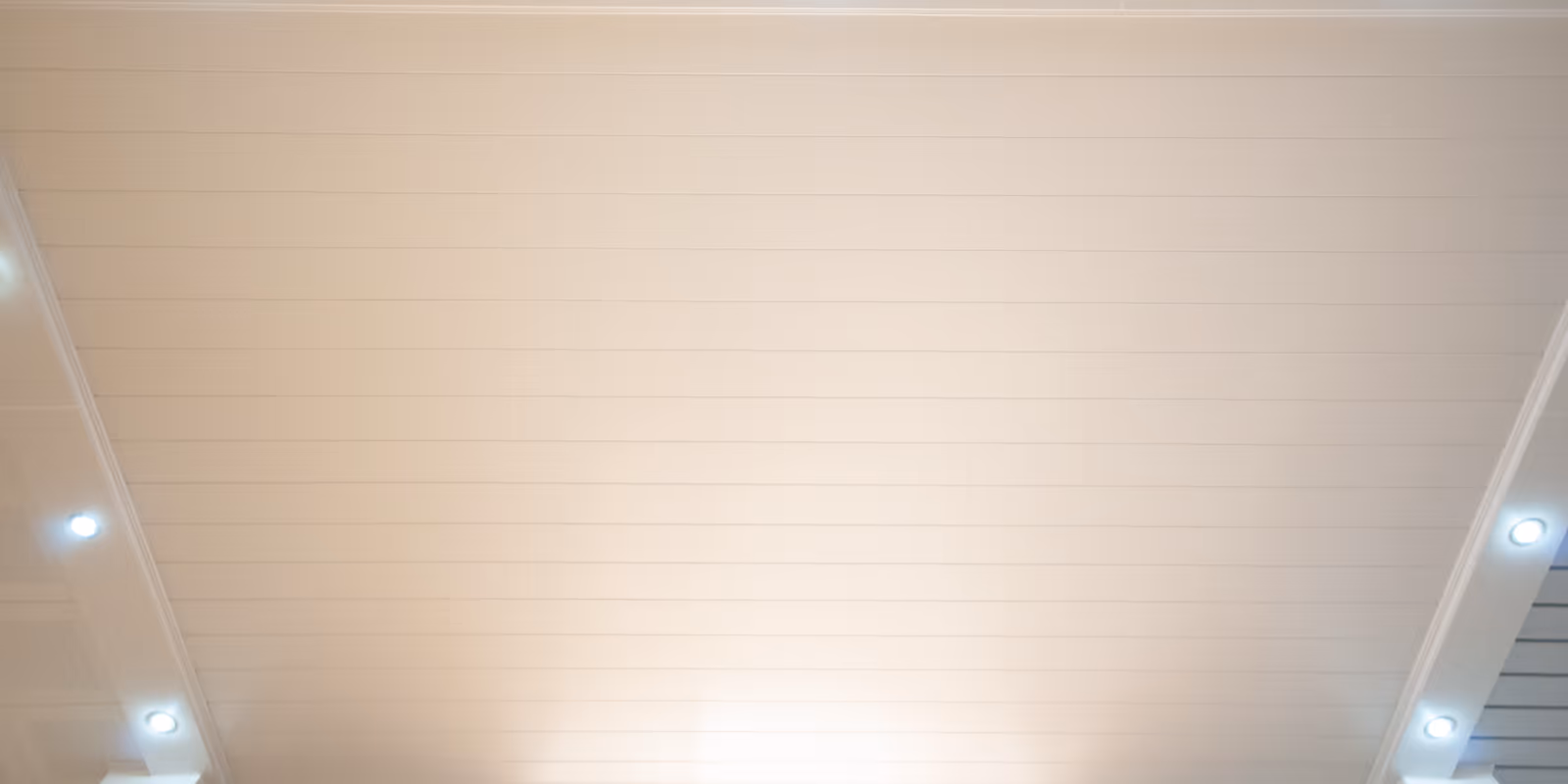 Cream strip ceiling running the length of a corridor