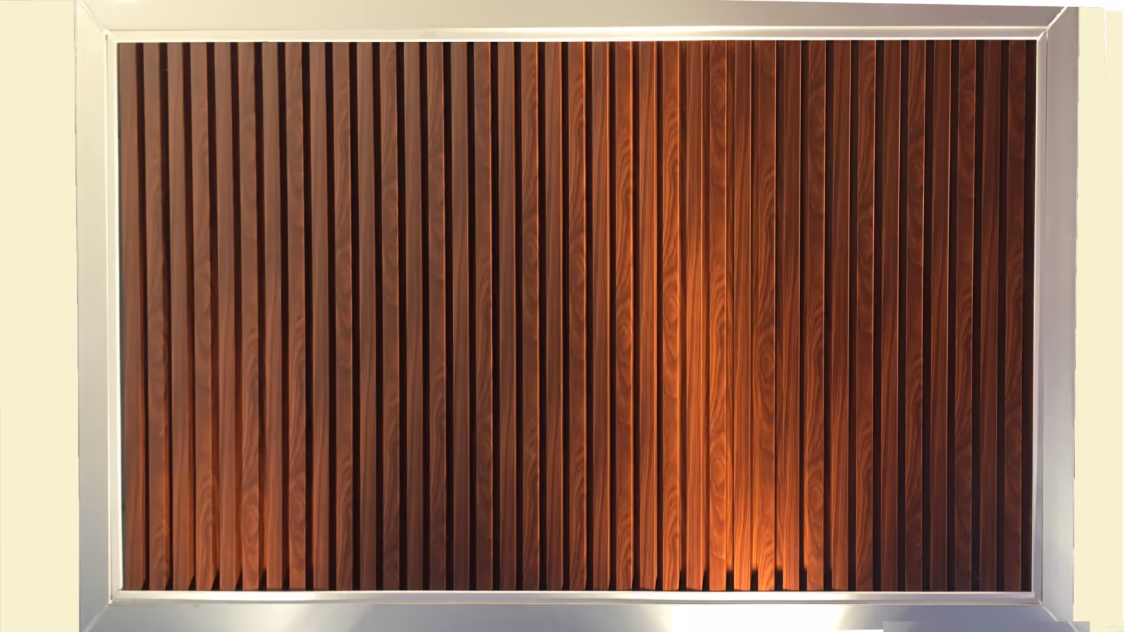 Wood grain strip ceiling panels set in a metal reveal